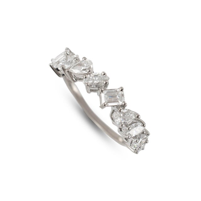 Gender: Ladies Metal Type: 14K White Gold Ring Size: 6.5 Width: 1.55 mm Weight: 2.64 grams Ladies 14K white gold seven-...