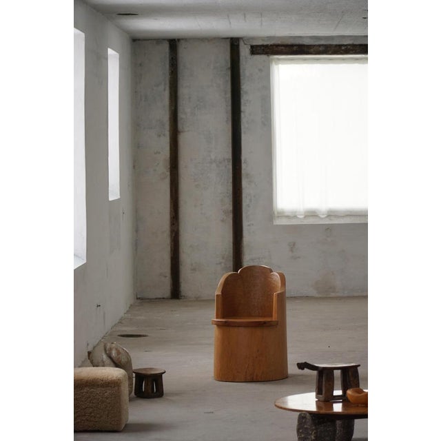 A captivating primitive stump chair, hand-carved in solid wood by an unknown Swedish cabinetmaker in the 1960s. This...