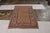 Made with hand-knotted wool originating circa 1900-1910, this antique Persian rug connotes a transitional Hamadan rug...