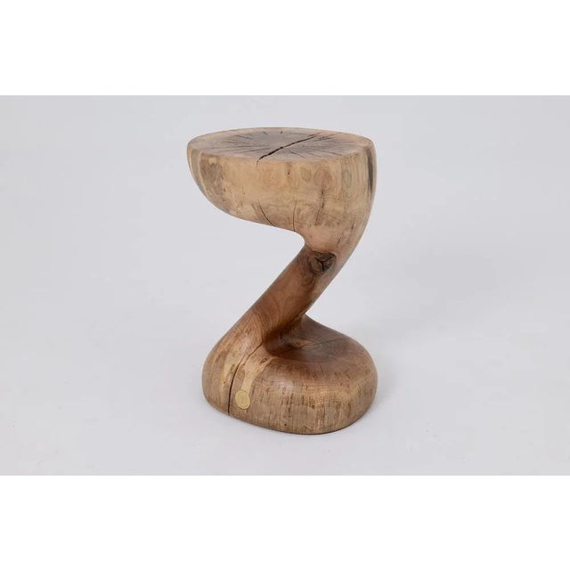This extraordinary sculptural side table is a one of a kind piece, carved entirely by hand from a single solid hardwood...
