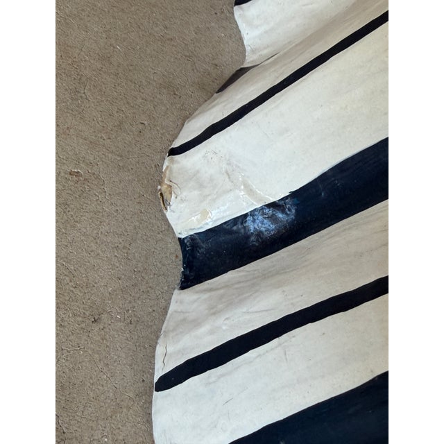 A charming and whimsical trompe-l’œil side table designed by Accessoires for the Strata Group, titled Scandinavian Bouquet...