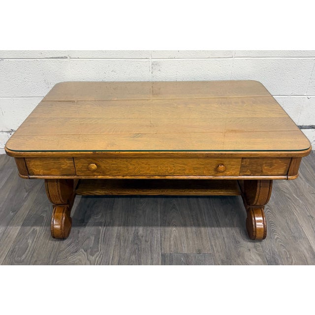 This is a stunning antique Empire tiger oak coffee table or cocktail table crafted from quarter-sawn oak, dating to the...