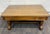 This is a stunning antique Empire tiger oak coffee table or cocktail table crafted from quarter-sawn oak, dating to the...