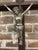 This antique Tramp Art crucifix is a free standing cross accented with a metallic Corpus Christi. The piece represents a...
