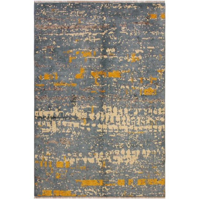 A mesmerizing addition to any décor, this exhilarating hand-knotted rug featuring exquisite coloration in an intricate...