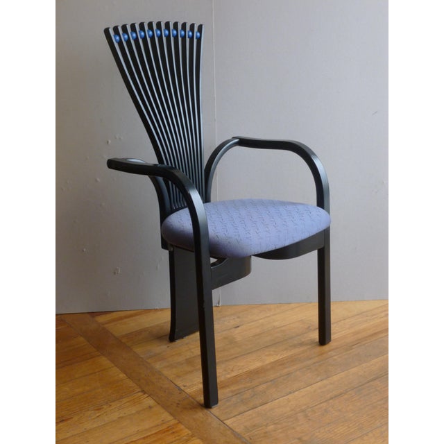 Pair of "Totem" armchairs, designed by Torstein Nilsen, manufactured by Westnofa, Norway, 1980s. These armchairs are made...