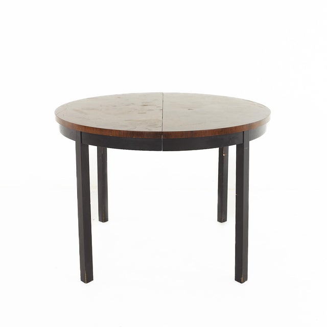 Founders Mid Century Rosewood Expanding Dining Table With 2 Leaves The table measures: 41 wide x 41 deep x 28 inches high;...