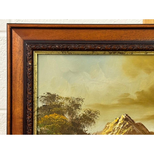 Golden mountain peaks rise above a quiet river where light and solitude meet 1975 Circa For Sale - Image 16 of 17