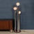 A vintage italian floor lamp with three lights attributable to carlo nason. A beautiful chromed steel structure supports...