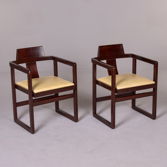 Found in Italy, this set of four Asian-inspired armchairs dates from the 1960s. Frames are dark-stained wood of unknown...