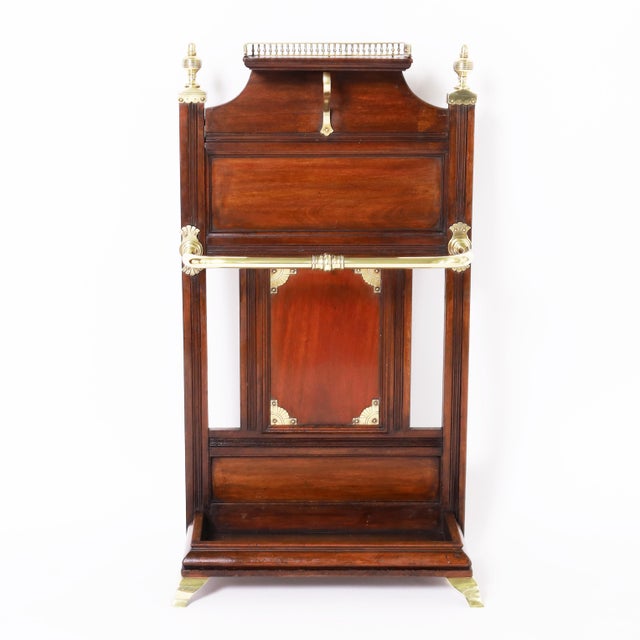Handsome 19th Century British Colonial gentleman's cane or umbrella stand crafted in mahogany in an Eastlake style...