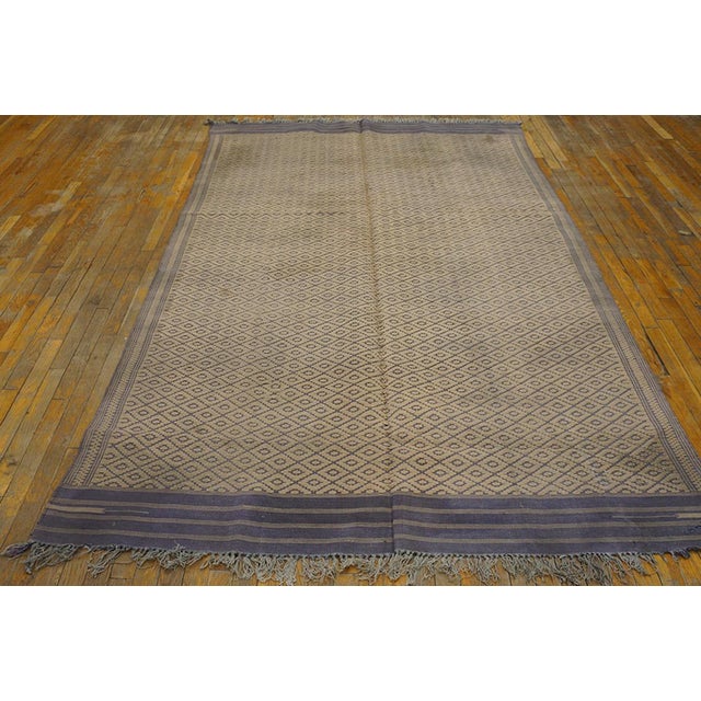 This is a really antique piece since dhurries over 100 years of age are truly rare. And it has a lozenge lattice pattern...