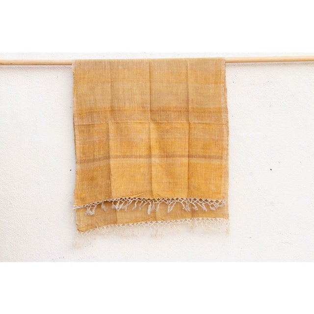 This throw represents the pinnacle of "Slow Fashion" for the home. Hand-crafted in rural Assam, India, it is woven from...