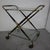 Mid-century Italian bar trolley by Cesare Lacca, 1950s This elegant bar cart, designed by Cesare Lacca in the 1950s, is a...