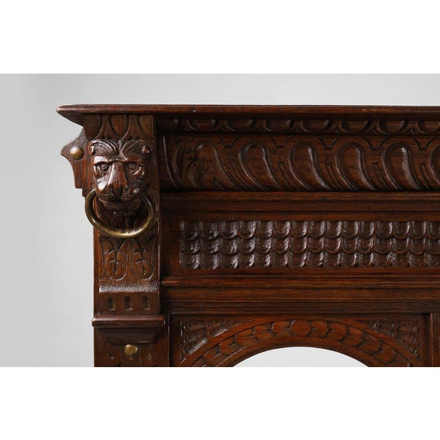 A striking French Gothic Revival settle bench crafted in solid oak, dating to around 1850. Richly hand-carved throughout,...