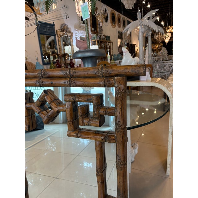 Vintage 1970s Palm Beach coastal tropical faux bamboo, pagoda, greek key wall mirror. Original mirror may have minor...