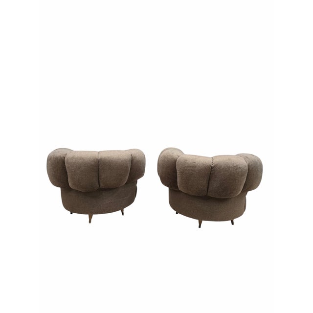 Mid-Century Modern Barrel Back Swivel Lounge Chairs Newly Reupholstered in Camel Alpaca Wool – Pair A striking pair of...