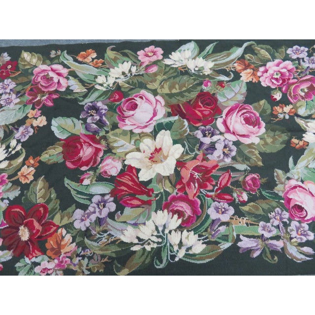 Features green border and floral center. Made in the mid 20th century