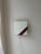 This vintage wall lamp demonstrates how powerful a simple design can be. The large panel of white textured glass forms a...