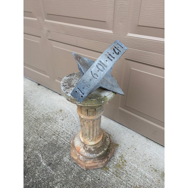 A stunning vintage English country or Neoclassical style iron garden sundial on a cast concrete Corinthian column pedestal...
