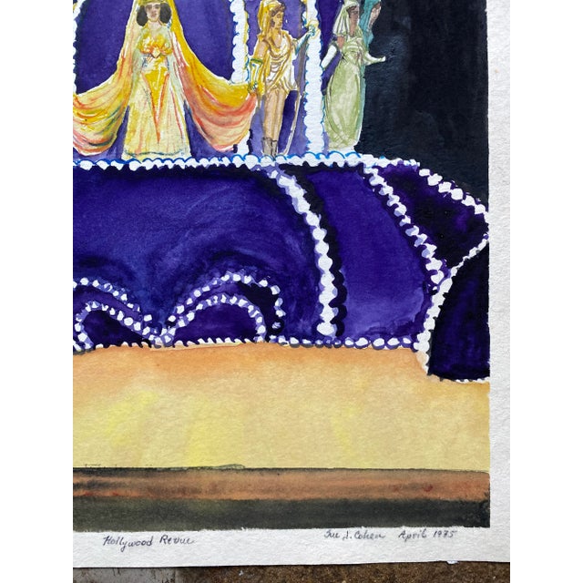 1975 watercolor by Sue Cohen in purple and gold. "Hollywood Revue" titled and signed lower right.