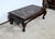 Chinese rectangular coffee table, fully lacquered, dark brown in color. Its original top is made up of inlaid patterns...