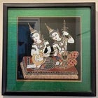 This stunning vintage Thai silk painting features two celestial musicians (Gandharvas) intricately hand-painted on black...