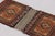 Hand-knotted in wool circa 1950-1960, this 1x3 antique tribal textile originates from Pakistan and represents a charming...