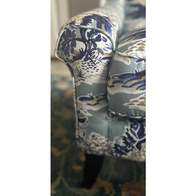 This exquisite, one-of-a-kind piece showcases a stunning linen fabric in a harmonious blend of pool blue, navy, cream, and...