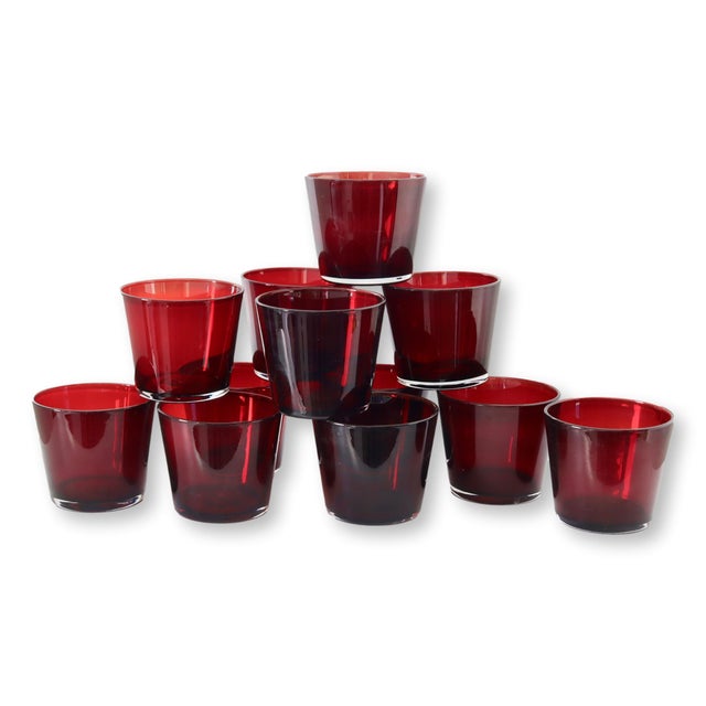 Raise a glass to timeless style with this stunning set of 12 vintage midcentury Culver glasses in the coveted Cranberry...