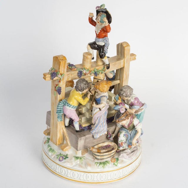 Important Meissen porcelain figurine set, “The Wine Press,” early 20th century. Early 20th-century Meissen porcelain...