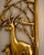 A sculptural mid-century decorative panel featuring a stag and fawn framed within stylized woodland forms. Lightweight and...