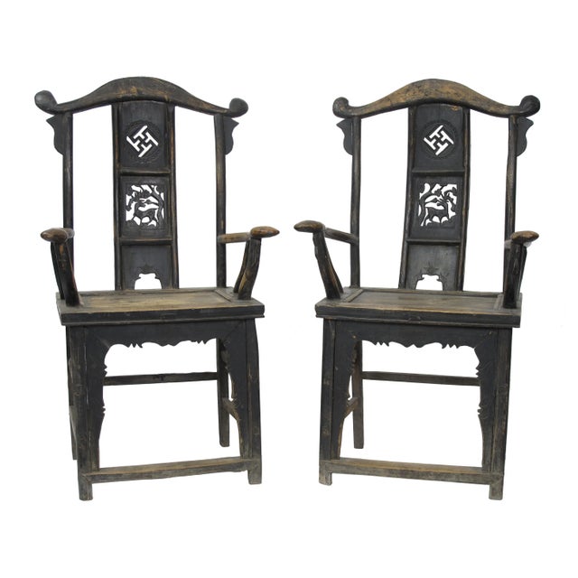 This pair antique Chinese high yoke back armchairs has a back splat adorn with nicely carved Buddhism symbol for peace and...