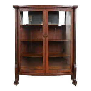 R. J. Horner Style Antique American Empire Oak Bow Front Bookcase Cabinet With Lion's Paw Feet, Circa 1890