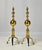 Large pair of vintage solid brass and cast iron andirons. Standing nearly 30 inches tall, these fireplace dogs feature...