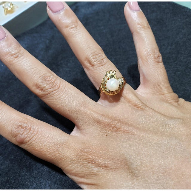 ♥ Ring Summary ♥ Main Stone: Pearl & Diamonds Diamond Carat Weight: .09cttw Pearl Size: 7mm Band Material: 14k Yellow Gold...