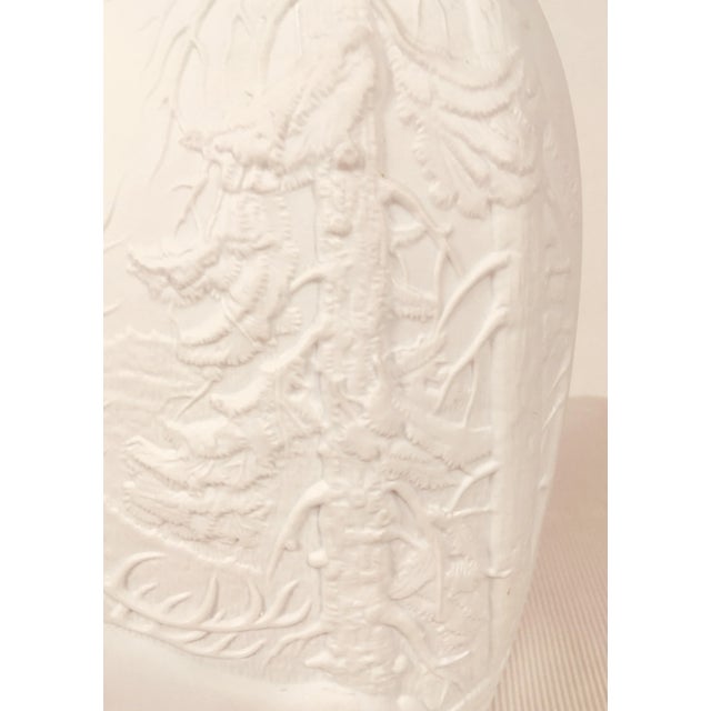 This is a bisque Vase by the Royal Bavarian porcelain company Kpm. The sculpture on the exterior of the vase is a stag And...