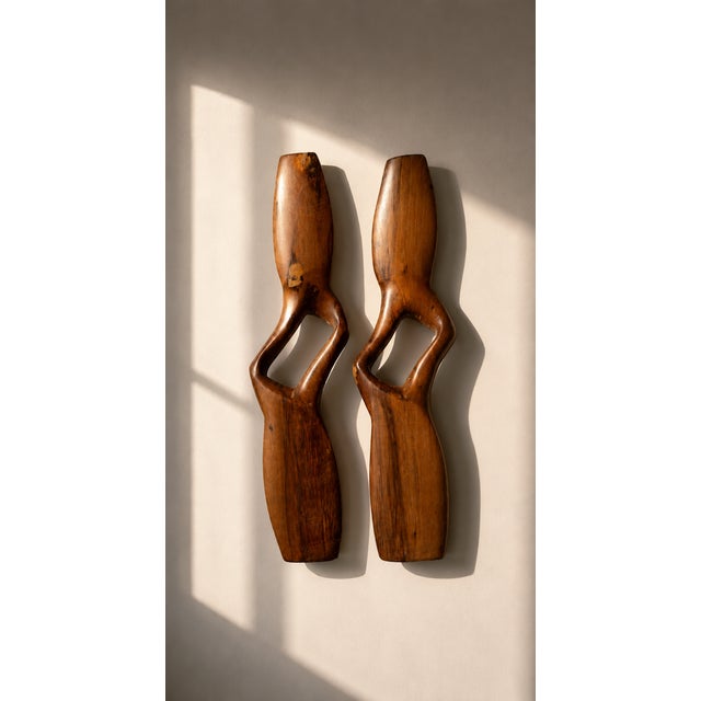 Splendid pair of abstract wall sculptures diptych in Mid Century Modern style dating from the 1960s 1970s These pieces...