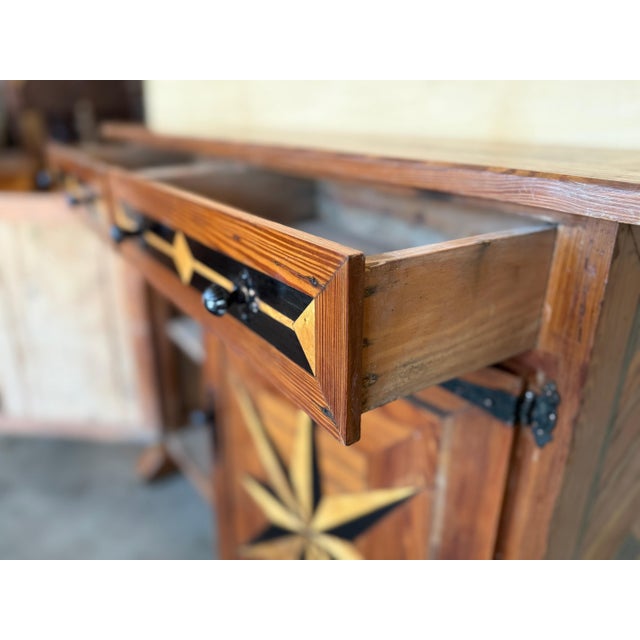 19th Spanish Carved Walnut Tuscan Two Drawers Credenza or Buffet with marquetry inlays of different type of woods in their...