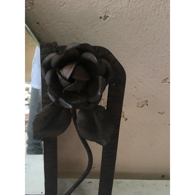 Iron mirror Art Deco with roses, circa 1930.