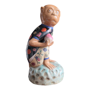 Chinese Vintage Porcelain Monkey Figurine Holding a Pear. Stamped on Bottom.
