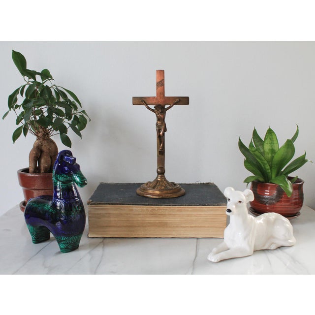 Vintage freestanding bronze crucifix. No makes mark. Patina on finish. Weights, 1lbs 6oz.