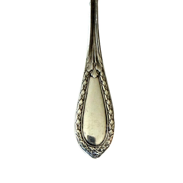 An antique French sterling silver and vermeil or gilt wash tea strainer C 1900. The beautiful over the cup style strainer...