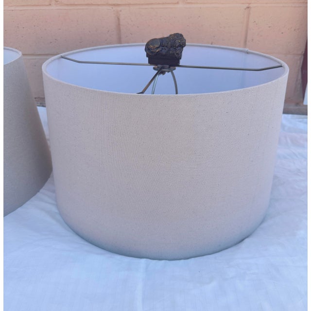 Pair of Uttermost Lamp Shades w/Lion Finials, shades are light beige. Perfect for a Rustic European look. Lions are a...