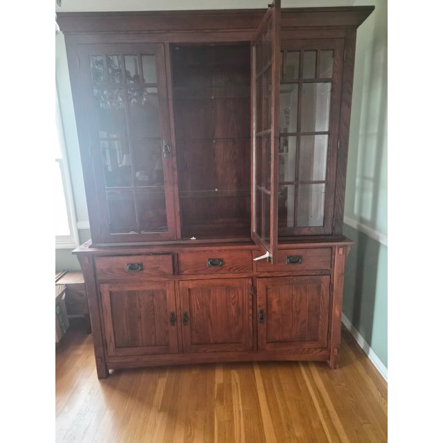A commanding presence in any dining room or study, this large-scale Stickley-style Mission oak china cabinet was sourced...