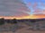 Evening Over a Dry Wash by Stephen Day | Oil on Panel Landscape at dusk with clouds and shrubs For Sale