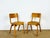 Charming pair of vintage chairs in light wood, typical of school or office furniture from the 1950s. Their laminated wood...