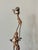 Balancing corn husk figures in a circus pile. Interesting folk art form to add to your decor. Most items found at Pub &...