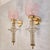 Pair of mid-century modern Murano glass wall sconces, Italy circa 1990s. The pair of Italian sconces is made of light pink...