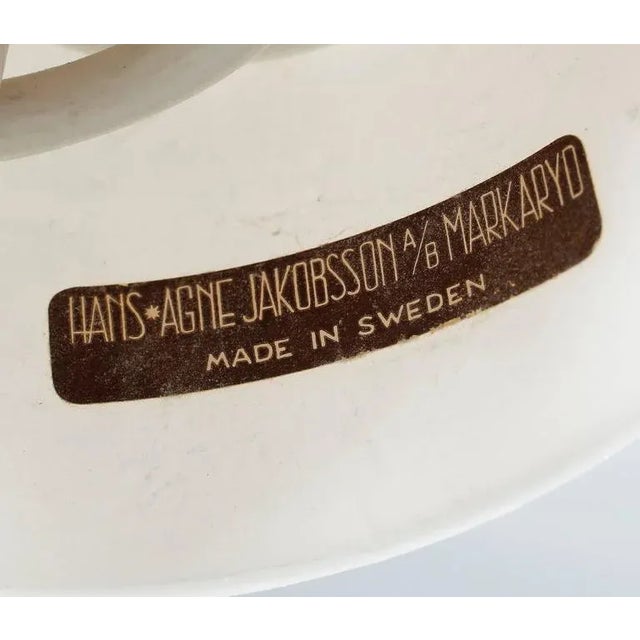 This pendant light with ivory-colored silk fringing and a brass frame and canopy is fitted with one E27 socket. The height...